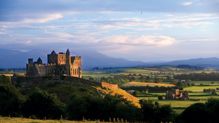 A panoramic view of the Rock of Cashel and the fields surrounding it
