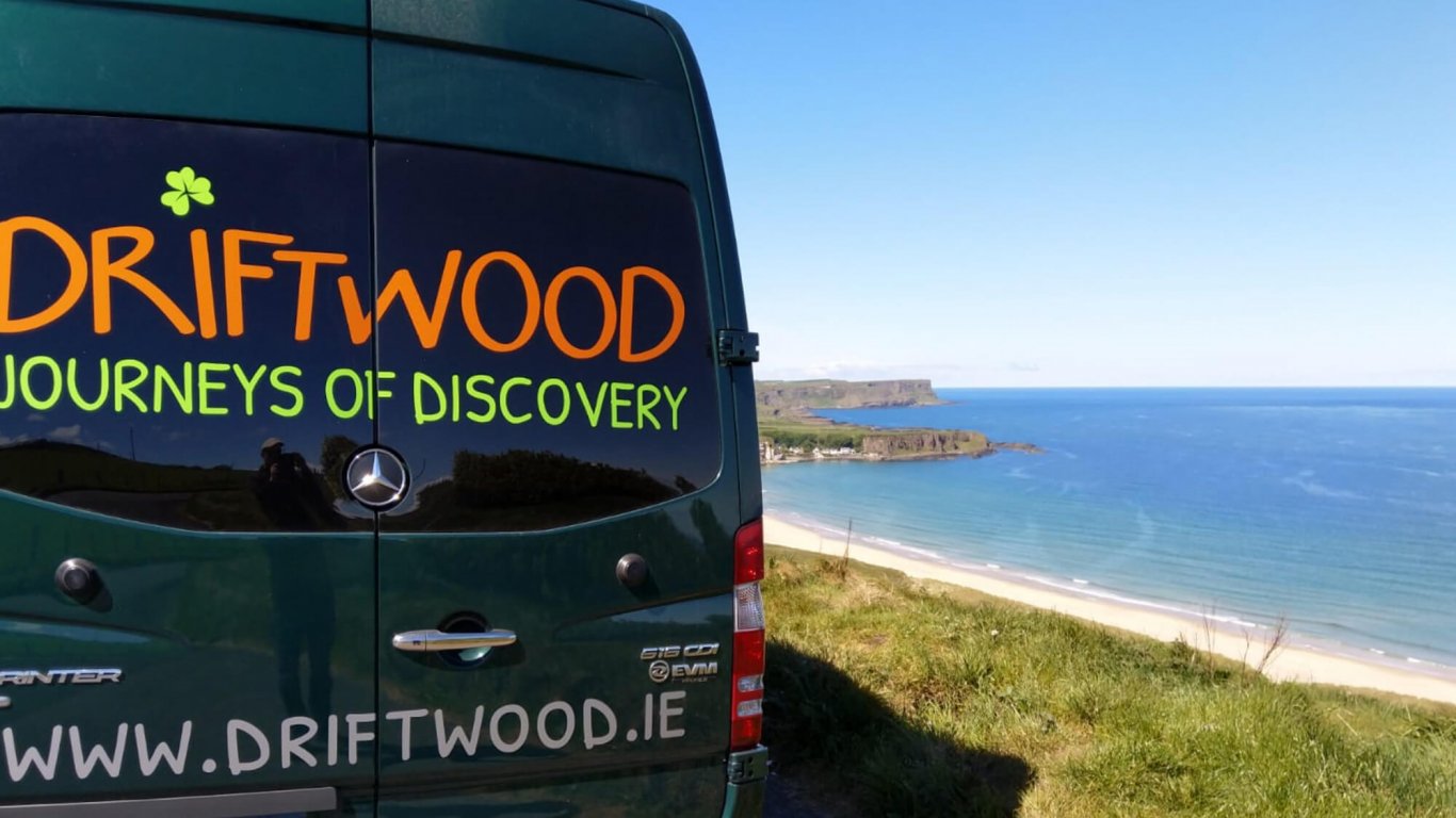 A Drifter tour vehicle visits White Park Bay in Northern Ireland
