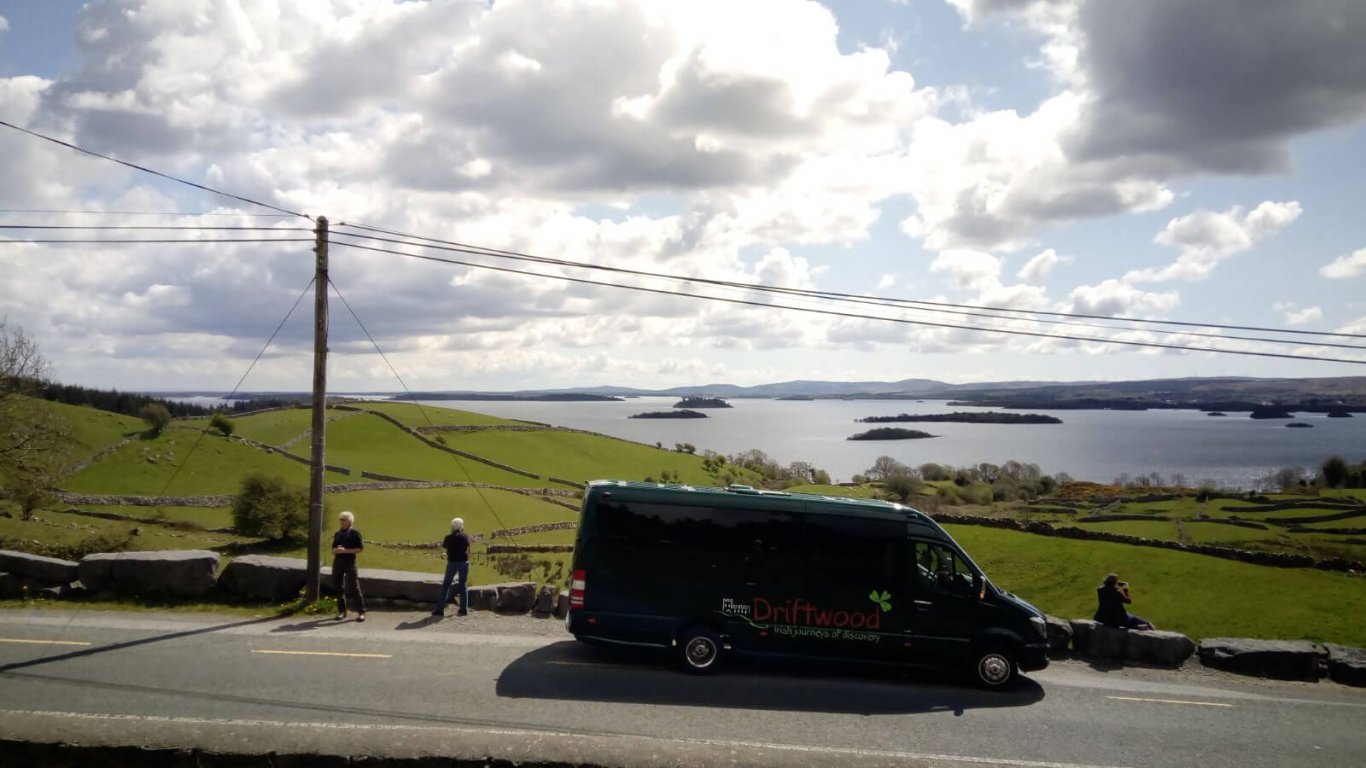 A Drifter tour vehicle stops at Lough Corrib in Ireland