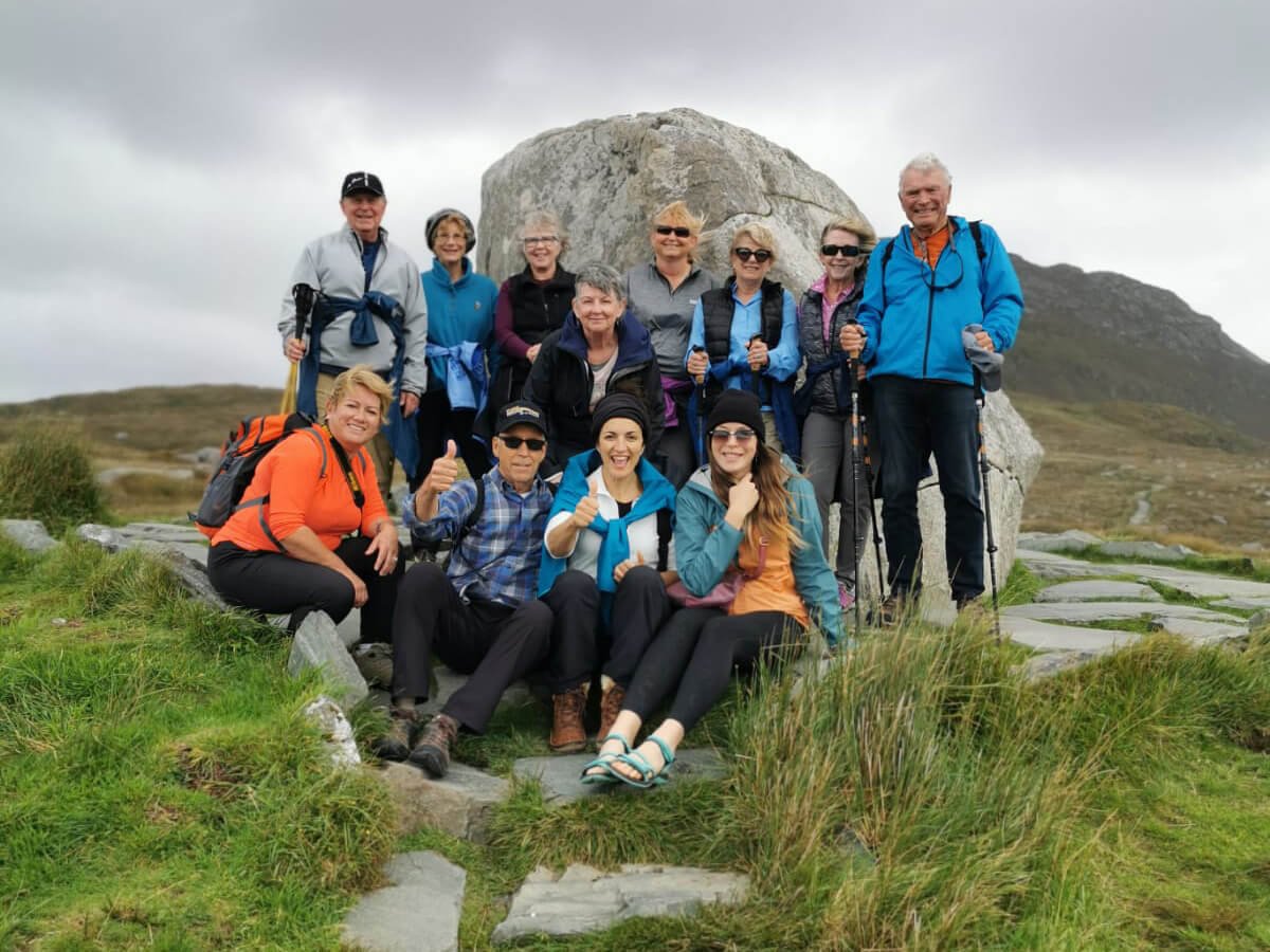 Tour group hiking on Diamond Hill in Connemara, Ireland