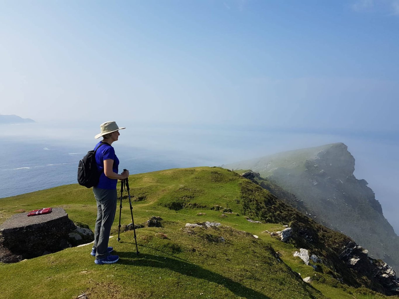 Female guest hiking in Ireland at Bray Head on Valentia Island in Kerry