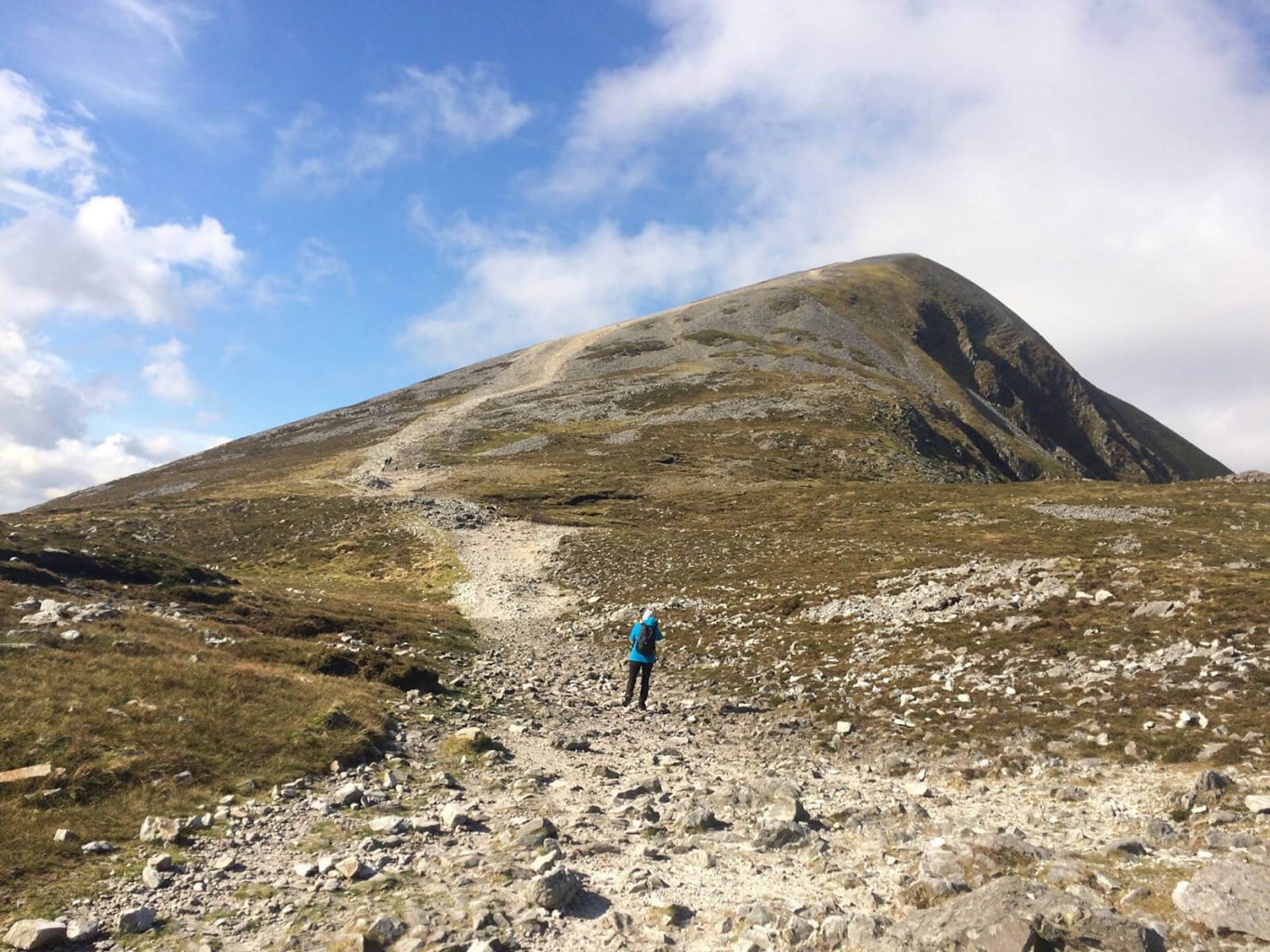 Tour guest hiking in Ireland at Croagh Patrick mountain in Mayo