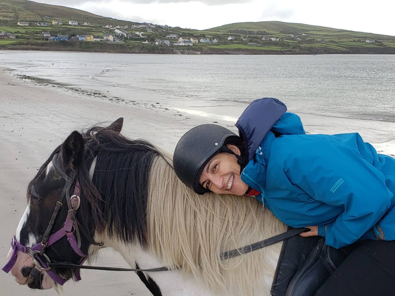 Lady smiling on a horse in Ireland