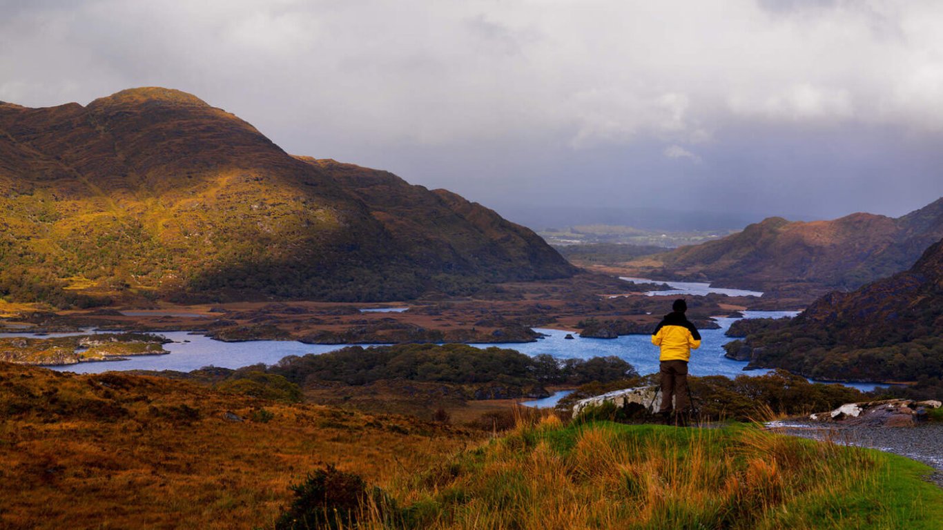 A man standing at ladies view over looking Killarney National Park