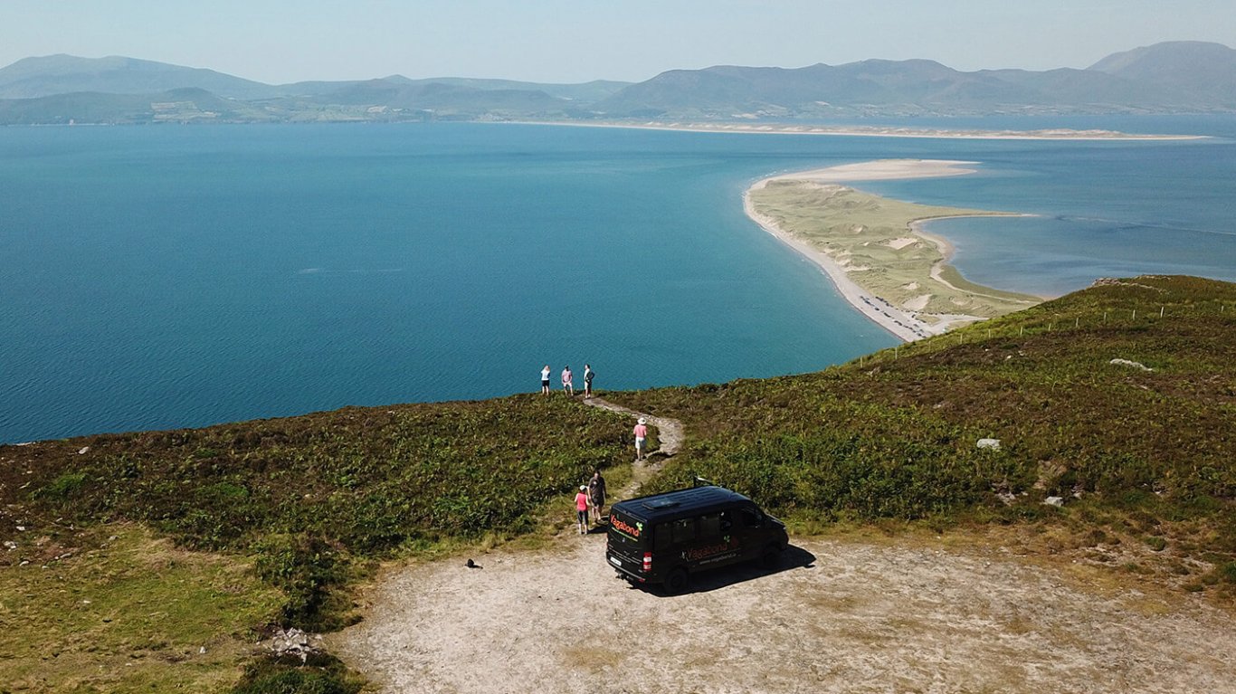 Vagabond group overlooking rossbeigh beach from a viewing point