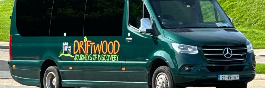 A Driftwood Small-Group Tours of Ireland vehicle with green livery