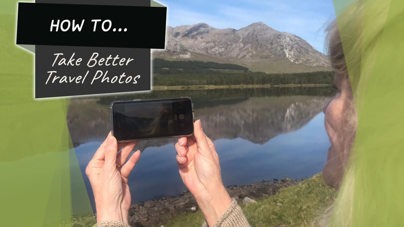 Graphics overlaid a lady taking a photo with her phone of a scenic lake and mountain in Ireland