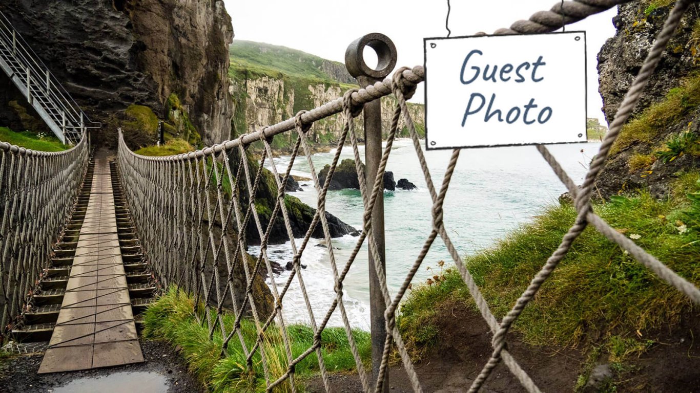 Guest photo of Carrick a rede rope bridge in Northern Ireland with guest photo graphic overlaid