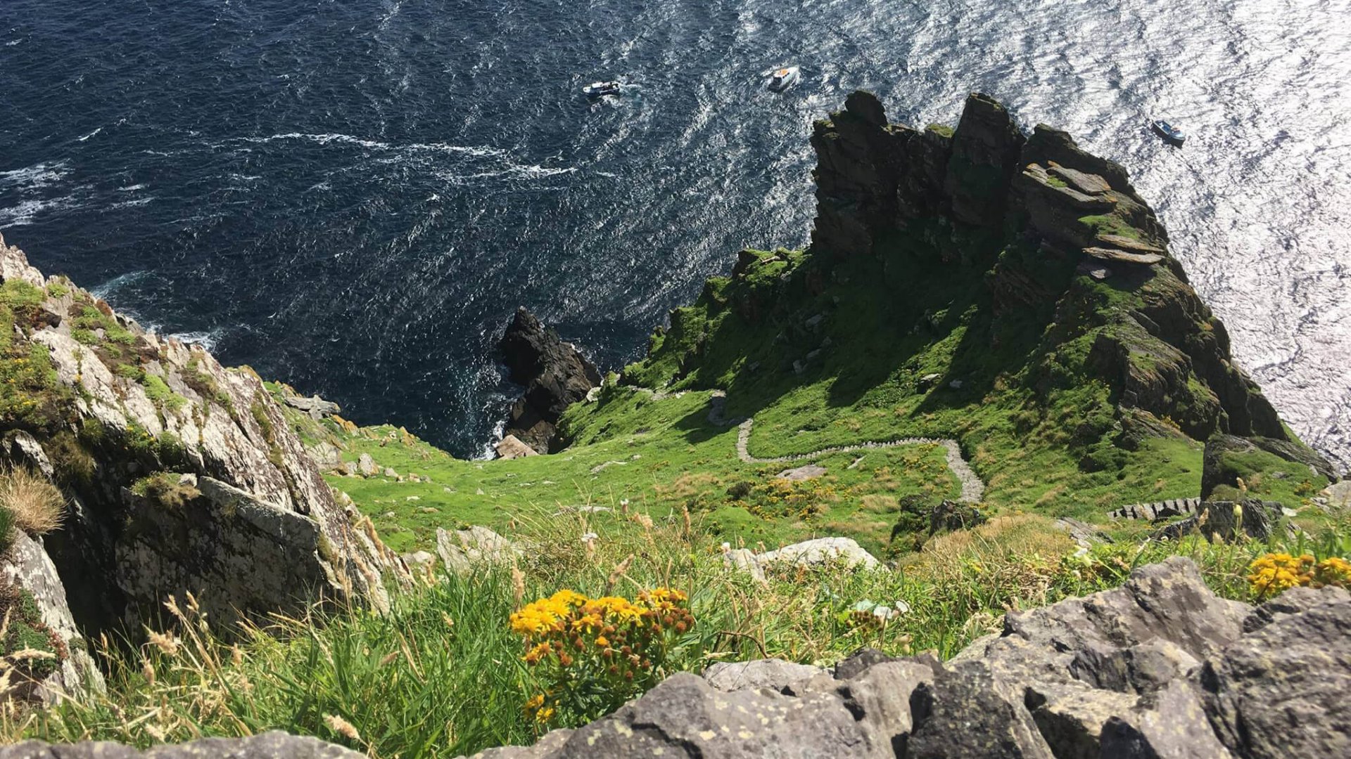 View from the summit of Skellig Michael Island down the steep steps to the sea