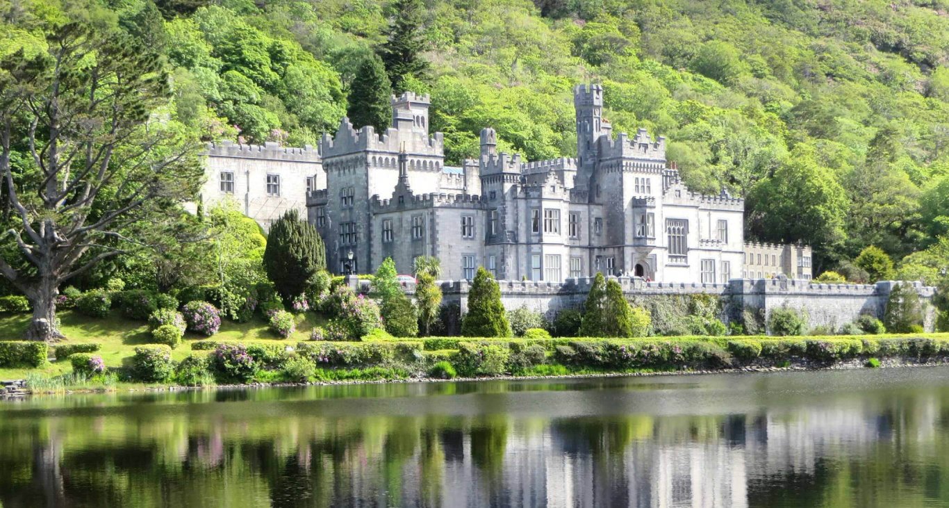 Kylemore Abbey, a historic building on a lake in Connemara, Ireland