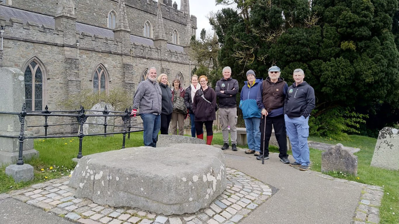 A driftwood group visiting the grave of St Patrick