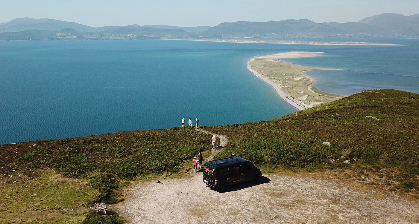Drone image of Rossbeigh with Vagabond bus and guests below