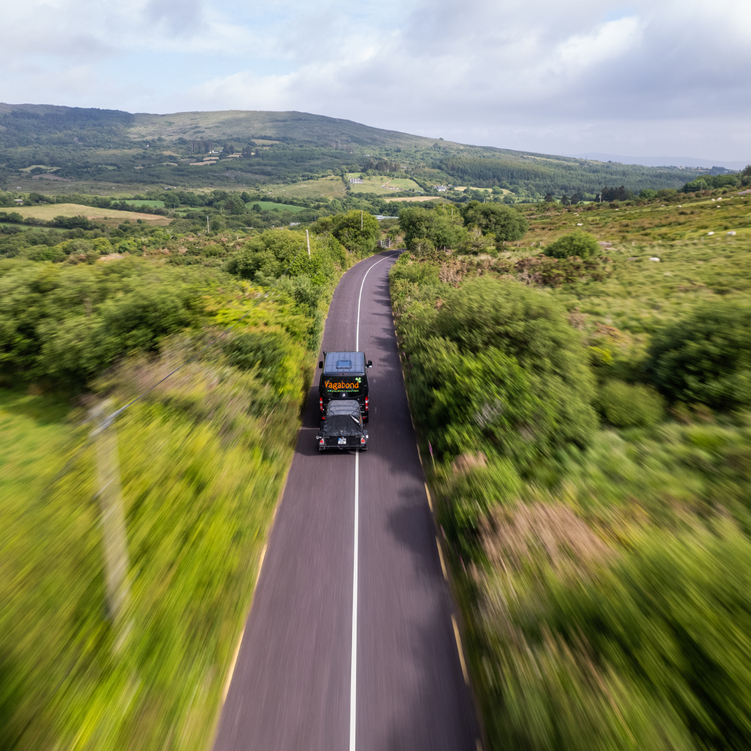 The vagabond vehicle driving on a country road