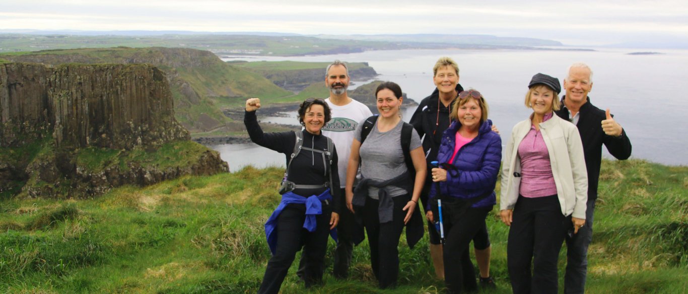 Hiking tour group on the Northern Ireland coast in Antrim