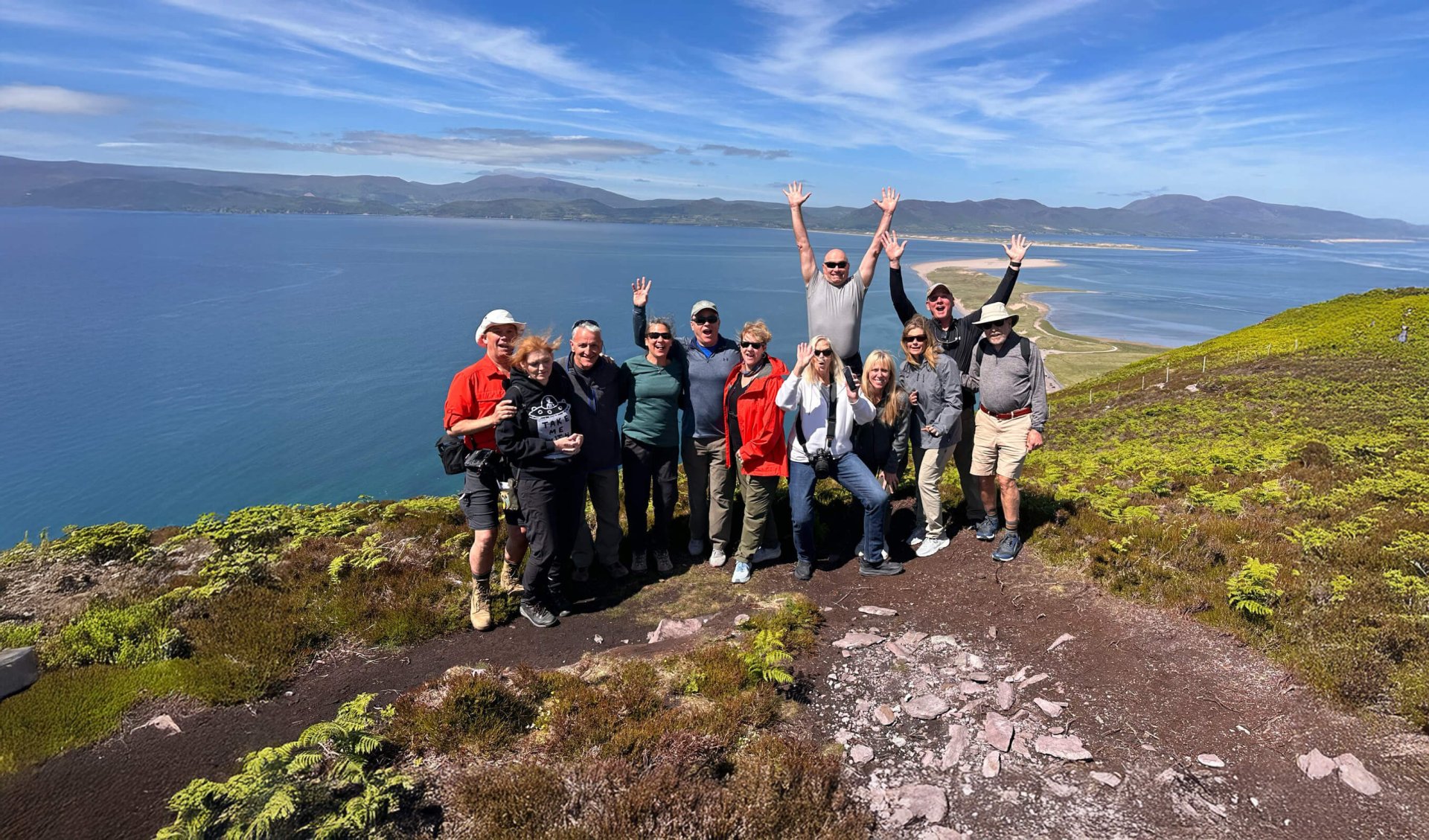 A group on rossbeigh lookout during their small group tour of ireland