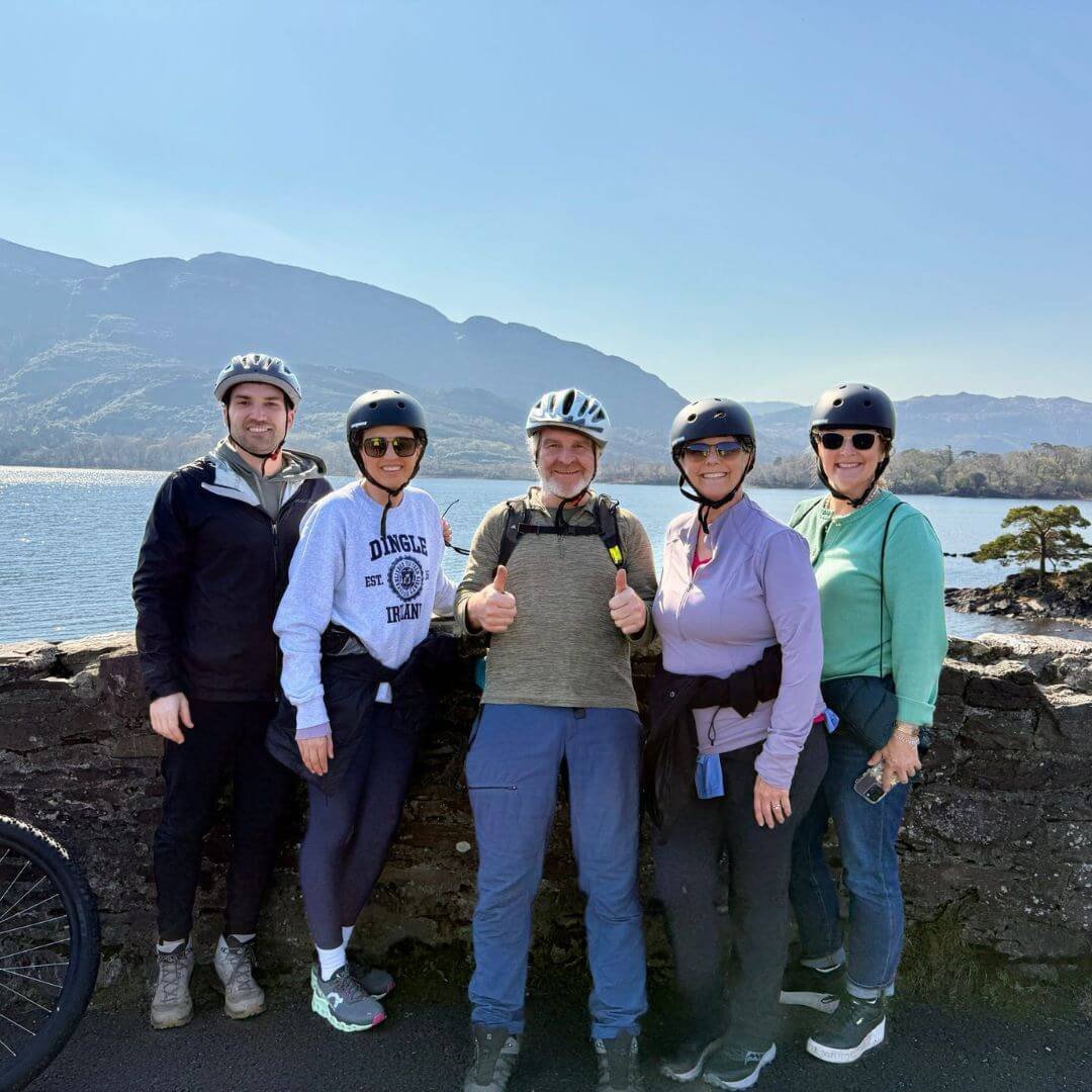 A group posing for a photo in killarney national park