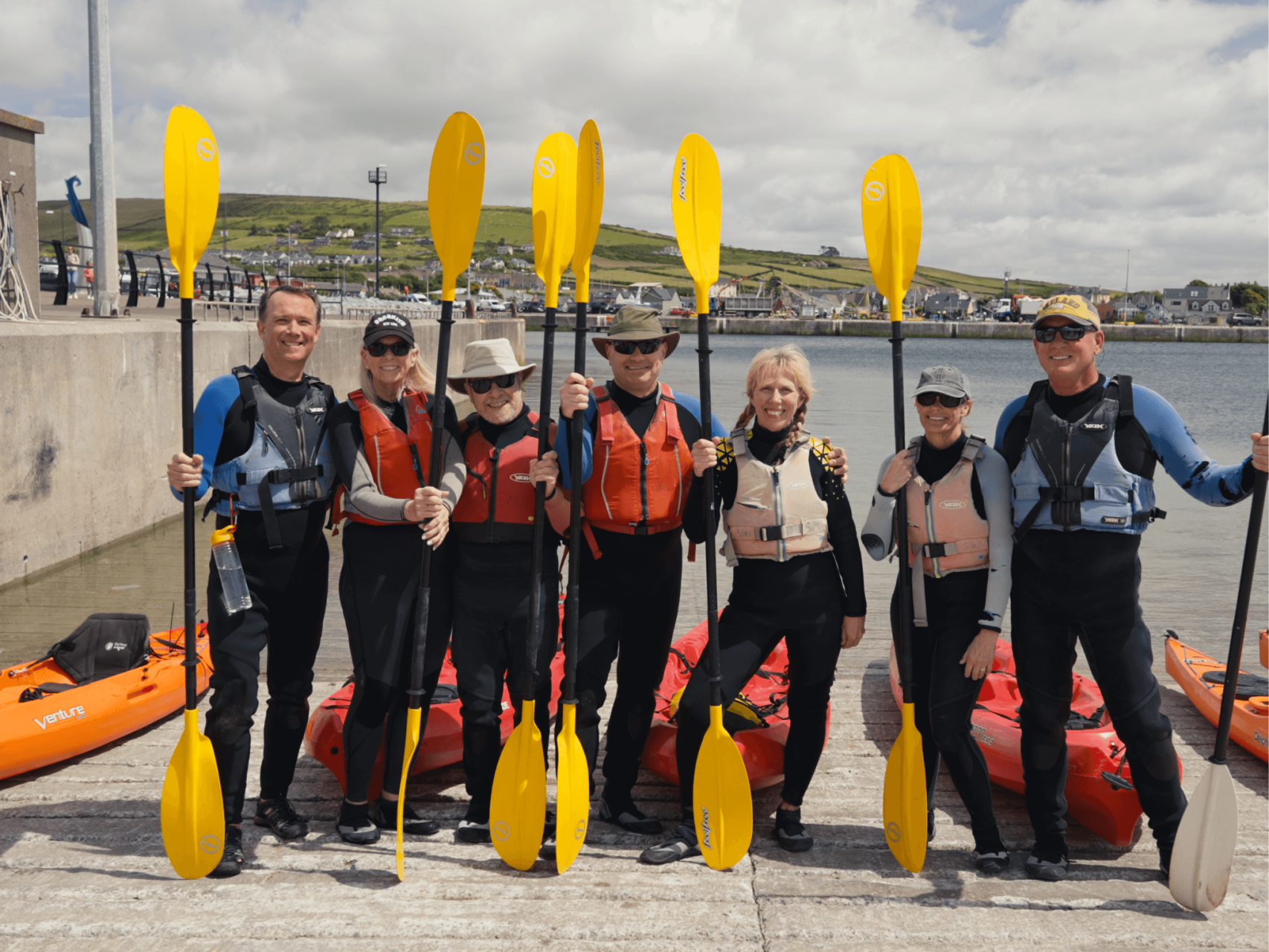 A group of guests waiting to go kayaking in Dingle Harbour