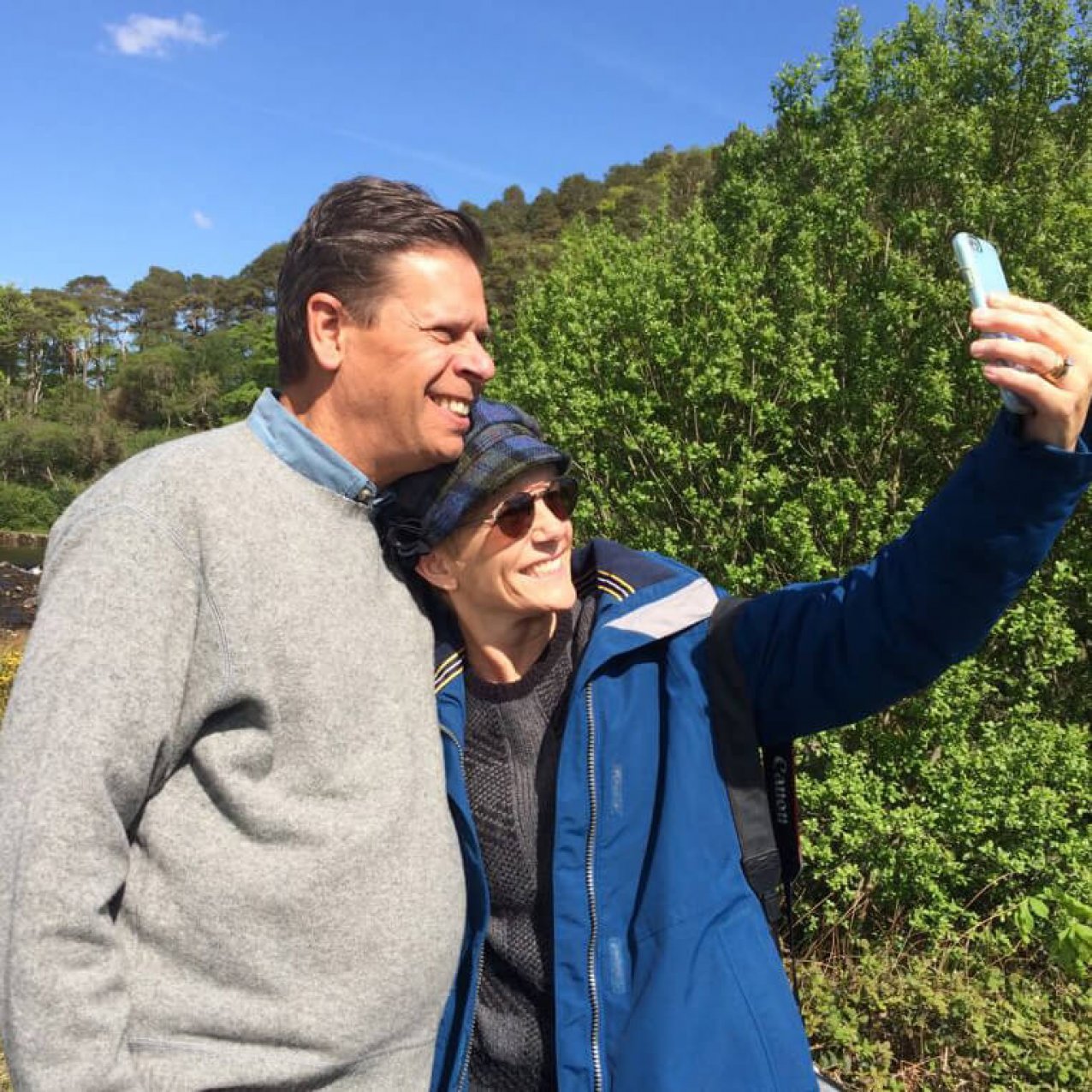 Couple smiling and taking a selfie in Ireland