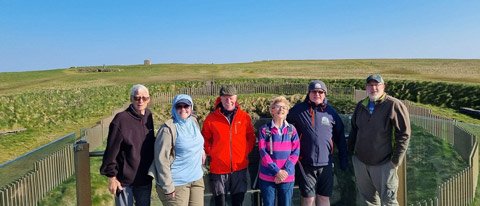Tour group at Downpatrick head in Ireland