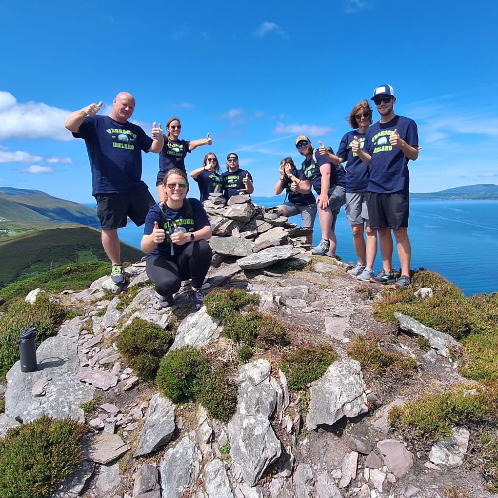 A family group on top of rossbeigh enjoying the sun in their vagabond merch
