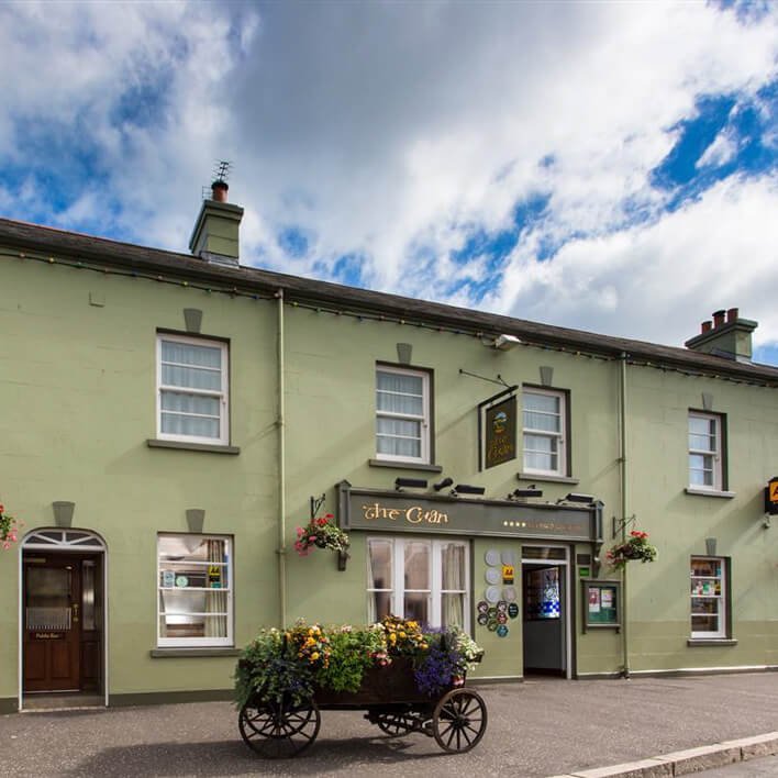 Green exterior of Cuan hotel in Northern Ireland