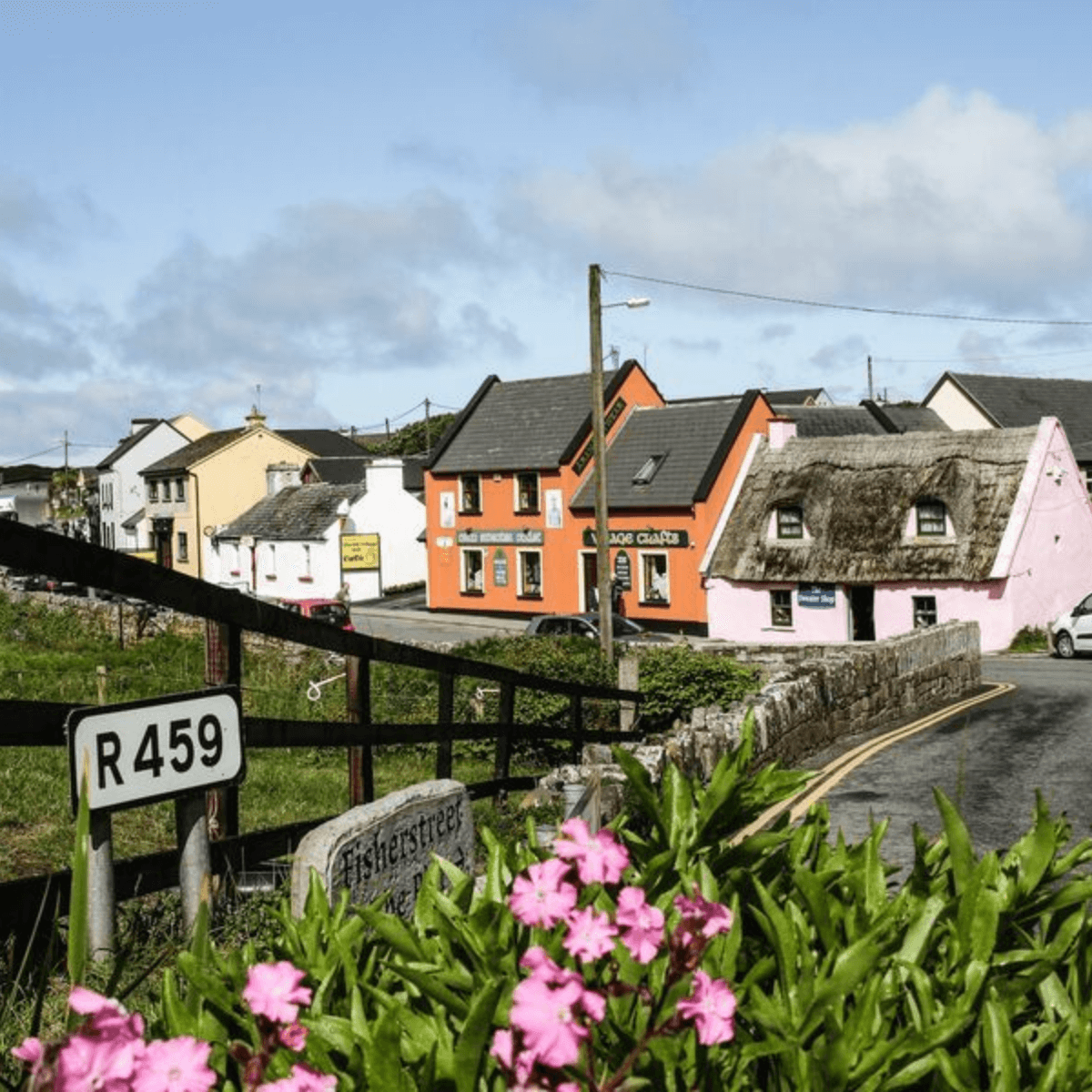 cottages on the side of the road in the village of doolin