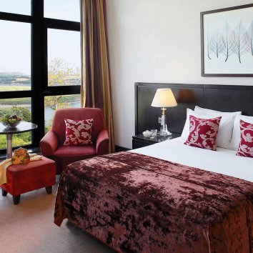 Interior of room with bed and window at Kinsale Hotel & Spa