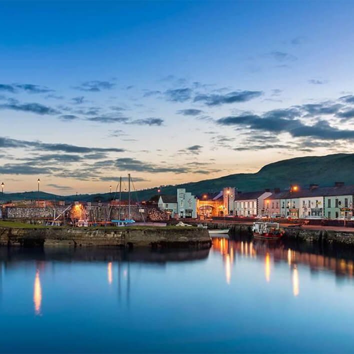 Picturesque evening light hits the harbour in Carnlough