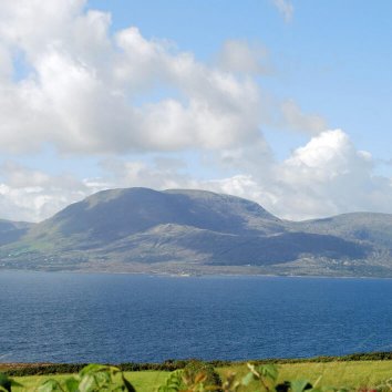 Clouds over mountain on Bantry Bay in Cork