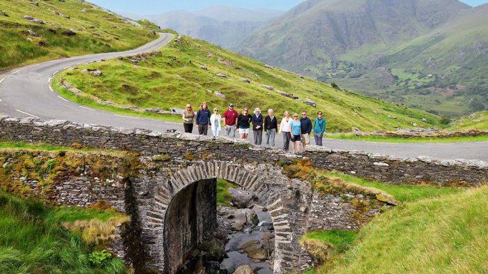 Tour group standing on a bridge in Ireland
