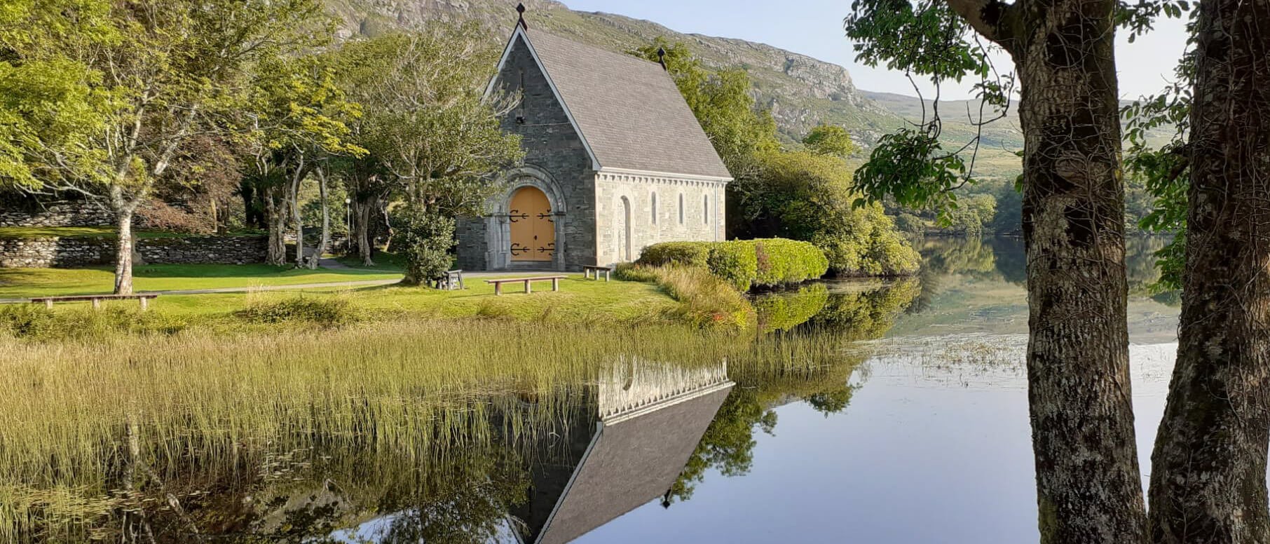 Historic chapel beside a lake in Ireland