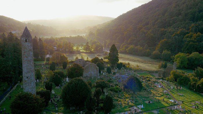 Glendalough monastic city with tower and graveyard