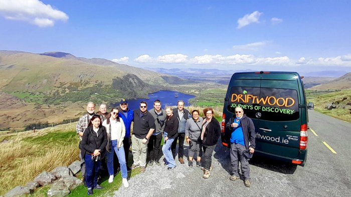 Happy touring group on the Healy Pass in Ireland
