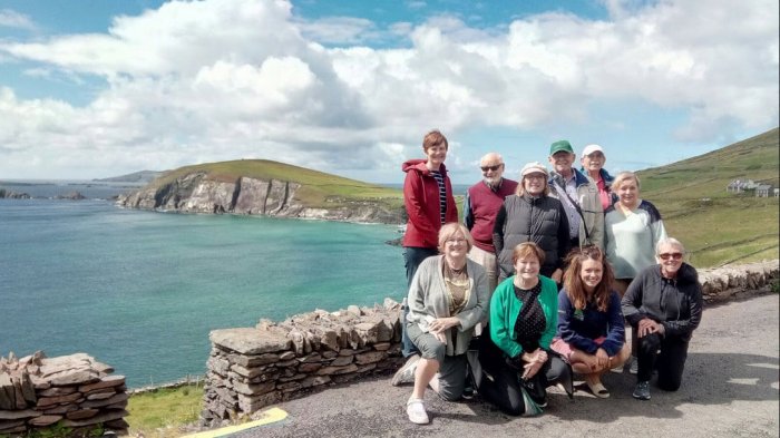 Happy tour group touring the Ring of Kerry in Ireland