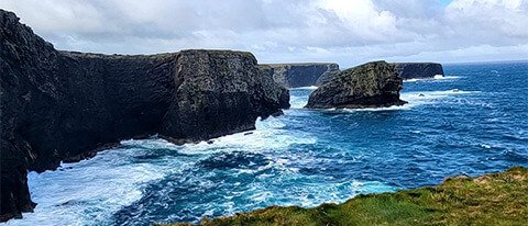 Cliffs and blue ocean on a 2 week tour of Ireland