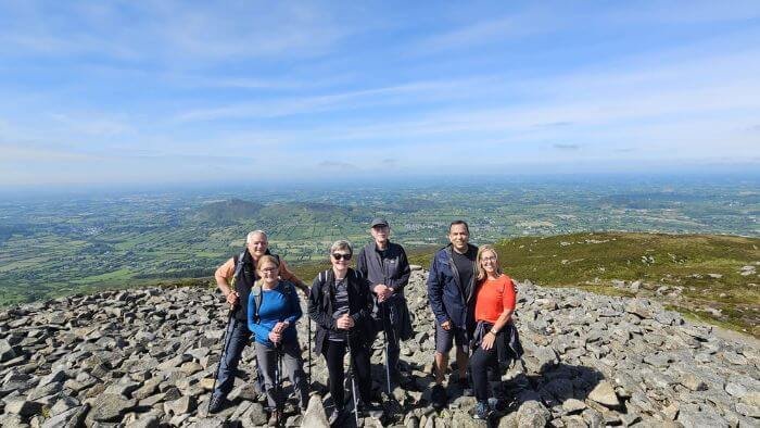 Active senior group hiking Ireland