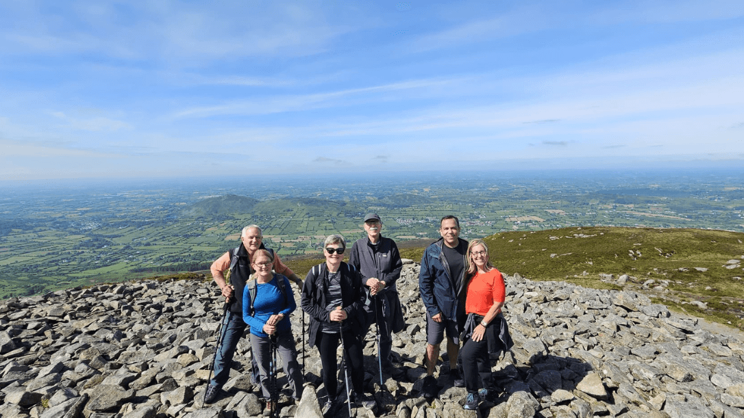 a group from our tours on the summit of slieve gullion