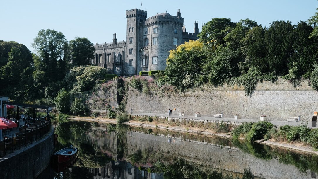 What to do in Kilkenny: Visit Kilkenny Castle overlooking the River Nore.