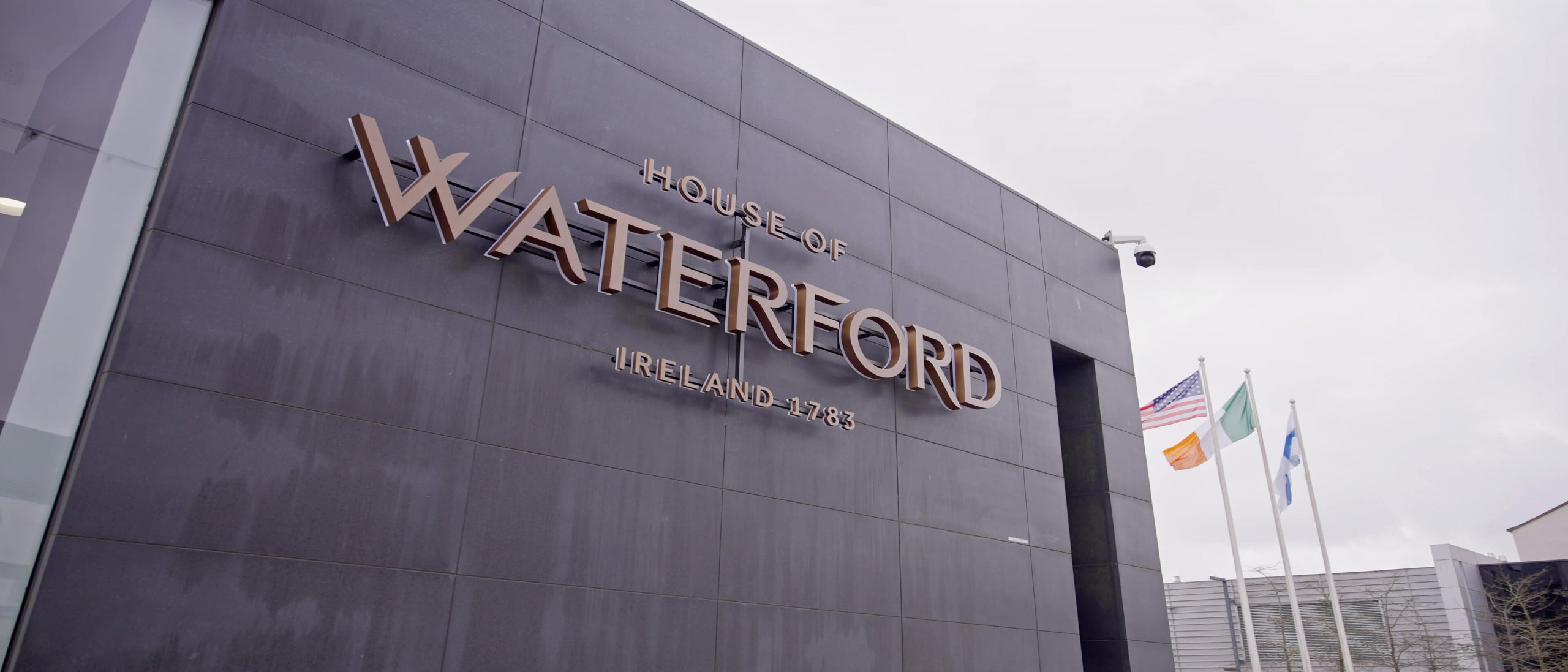 The front sign on the house of waterford building