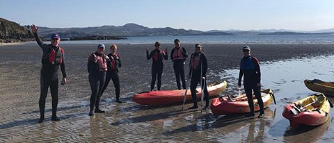Group sea kayaking on a 7 day Northern Ireland adventure tour