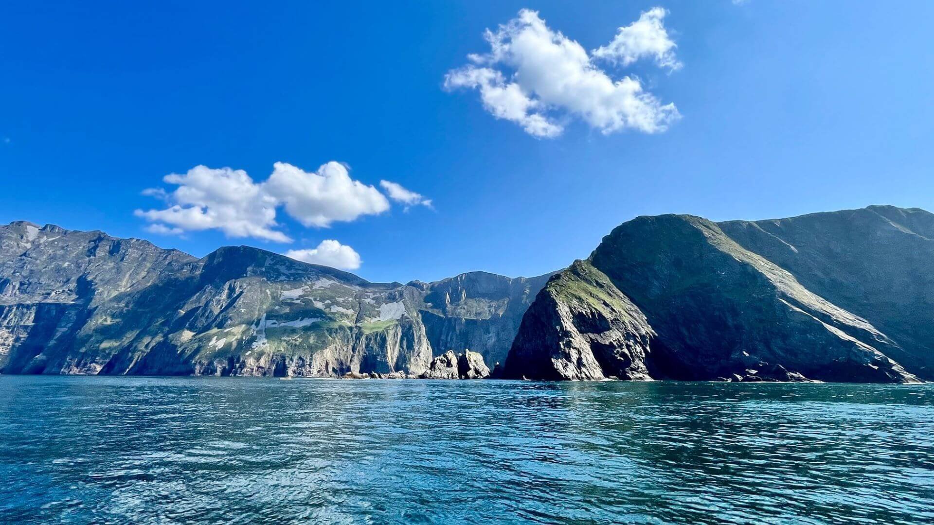 A photo of the slieve league cliffs from below in a boat 