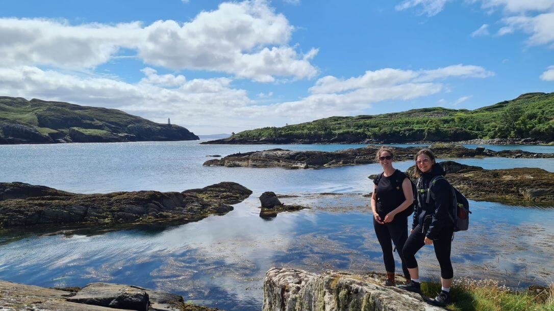 Two ladies doing the bullig bay loop walk with beara peninsula in the background