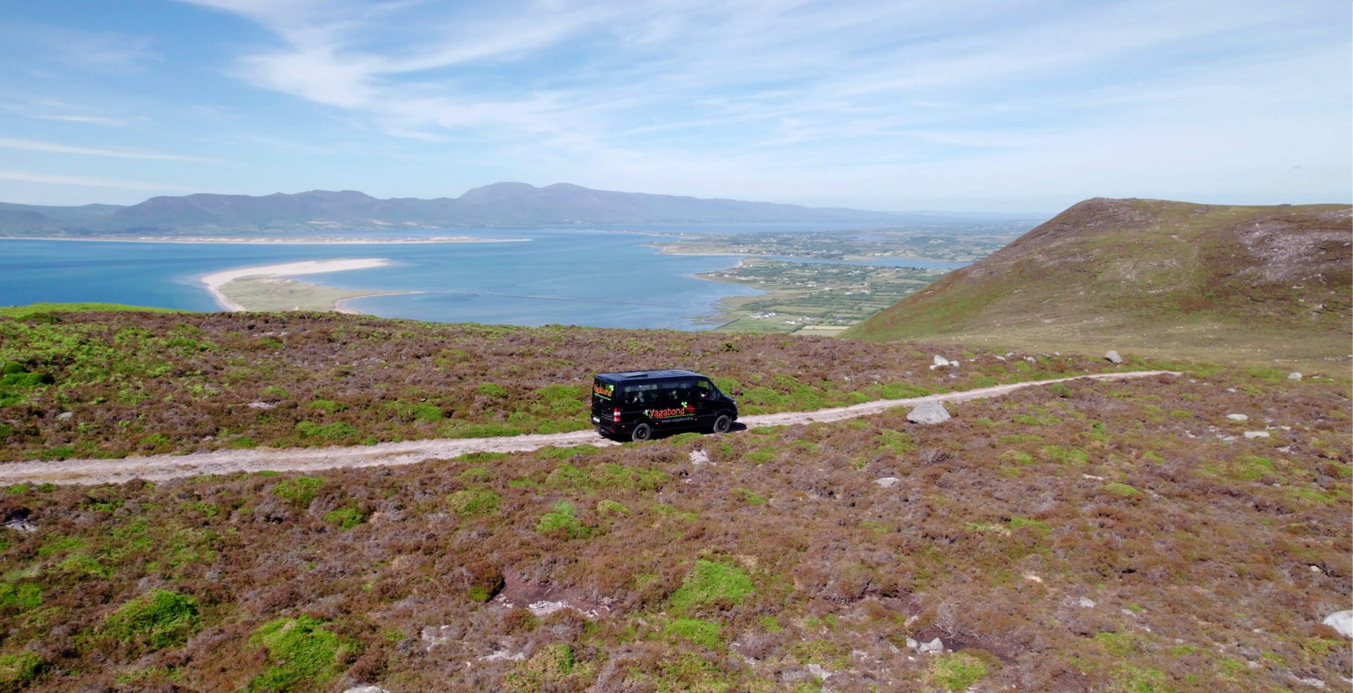 The Vagatron driving along a mountain looking out at rossbeigh beach