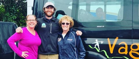 Two tour guests with a Vagabond guide on a 7 day tour of Ireland