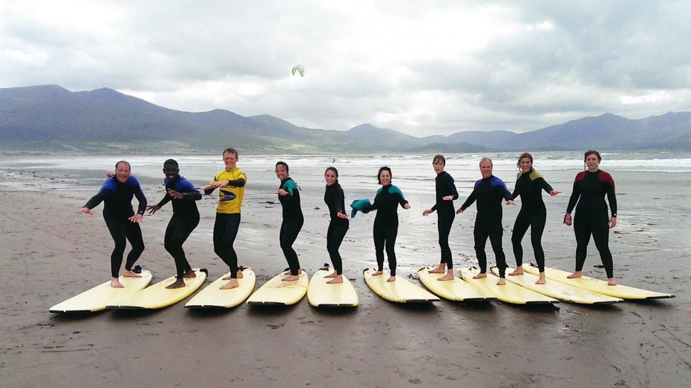 Surfers on a beach in Ireland