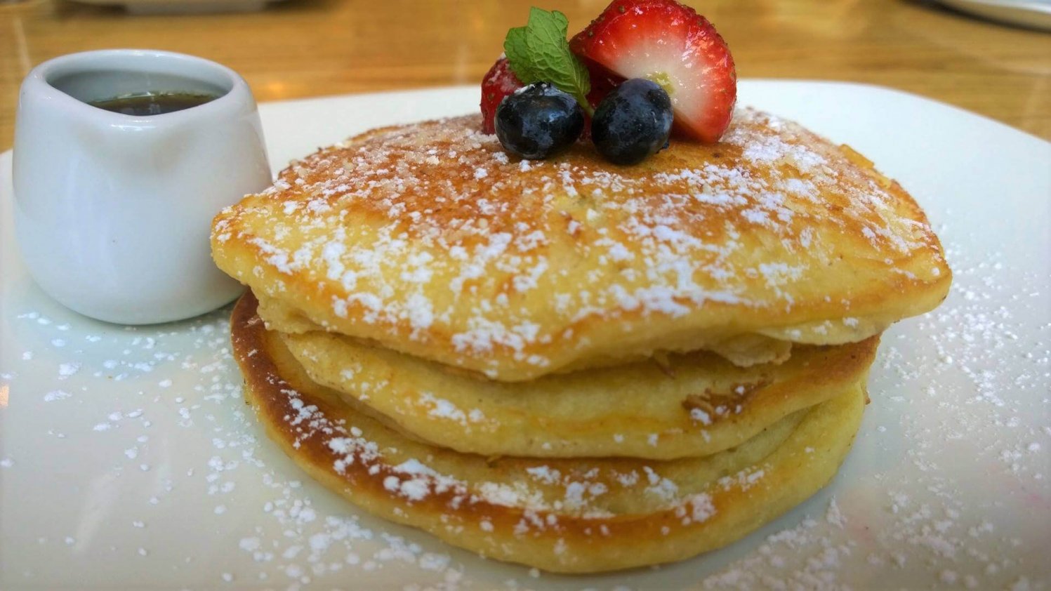 Pancake stack with fruit topping, served at Elephant and Castle in Dublin