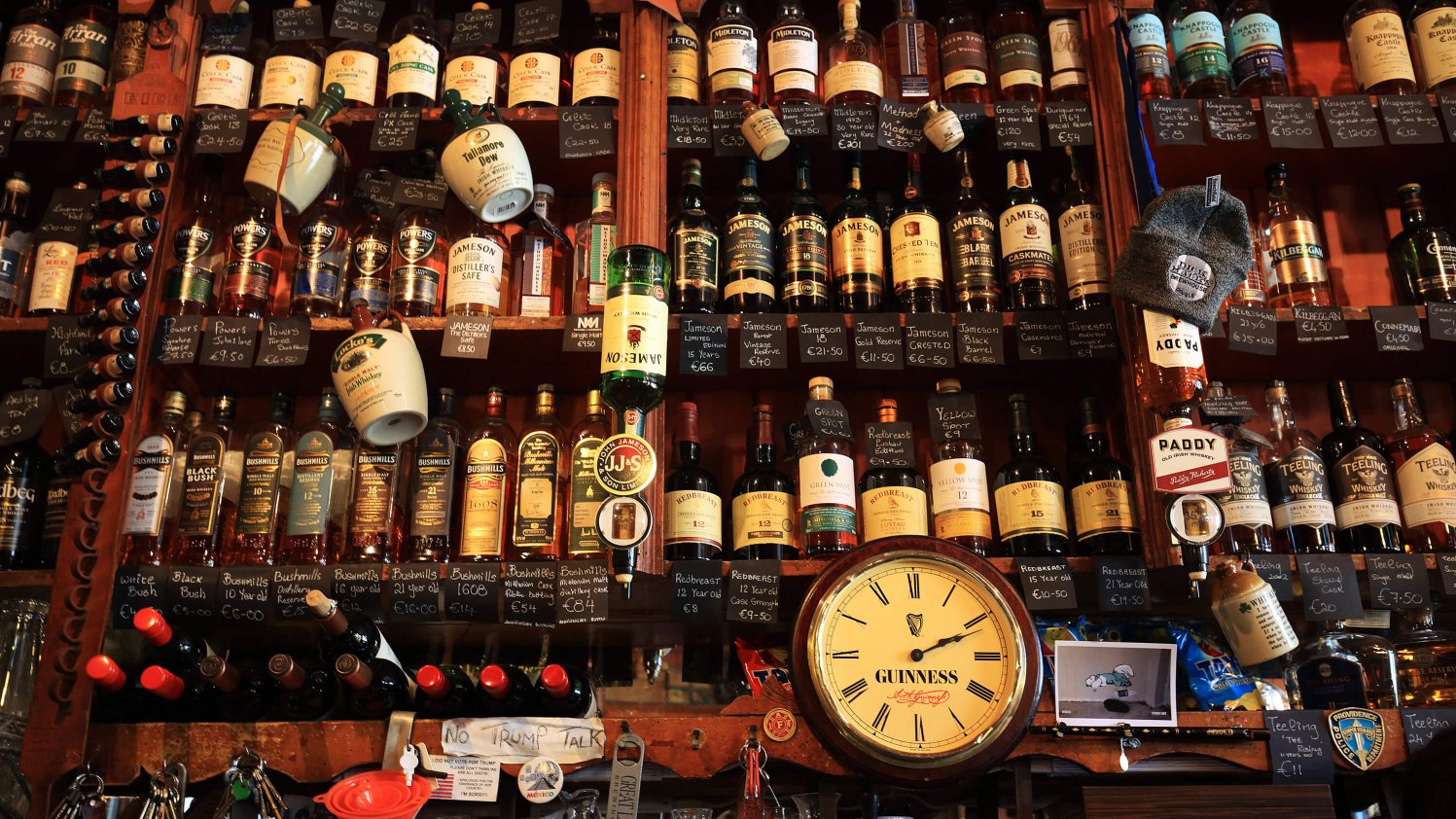 The extensive whiskey selection behind the bar at Dick Mack's in Dingle, Ireland