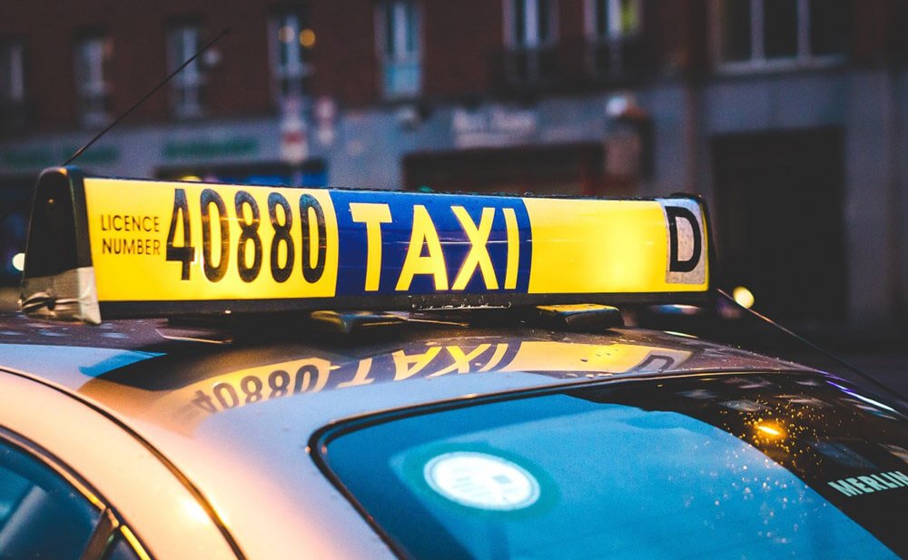 Taxi with roof sign illuminated in Ireland