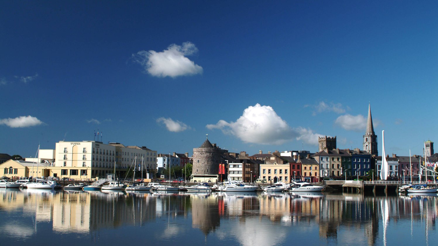 Waterford quays with reflection on the river